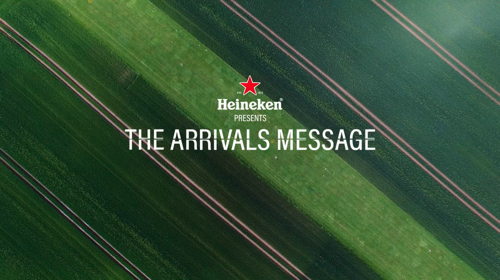 Heineken Arrivals messages over an airfield